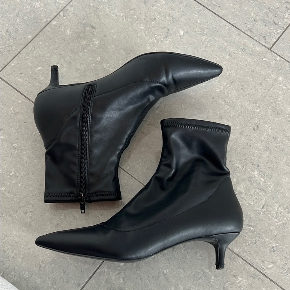 Black ankle boots in faux black leather